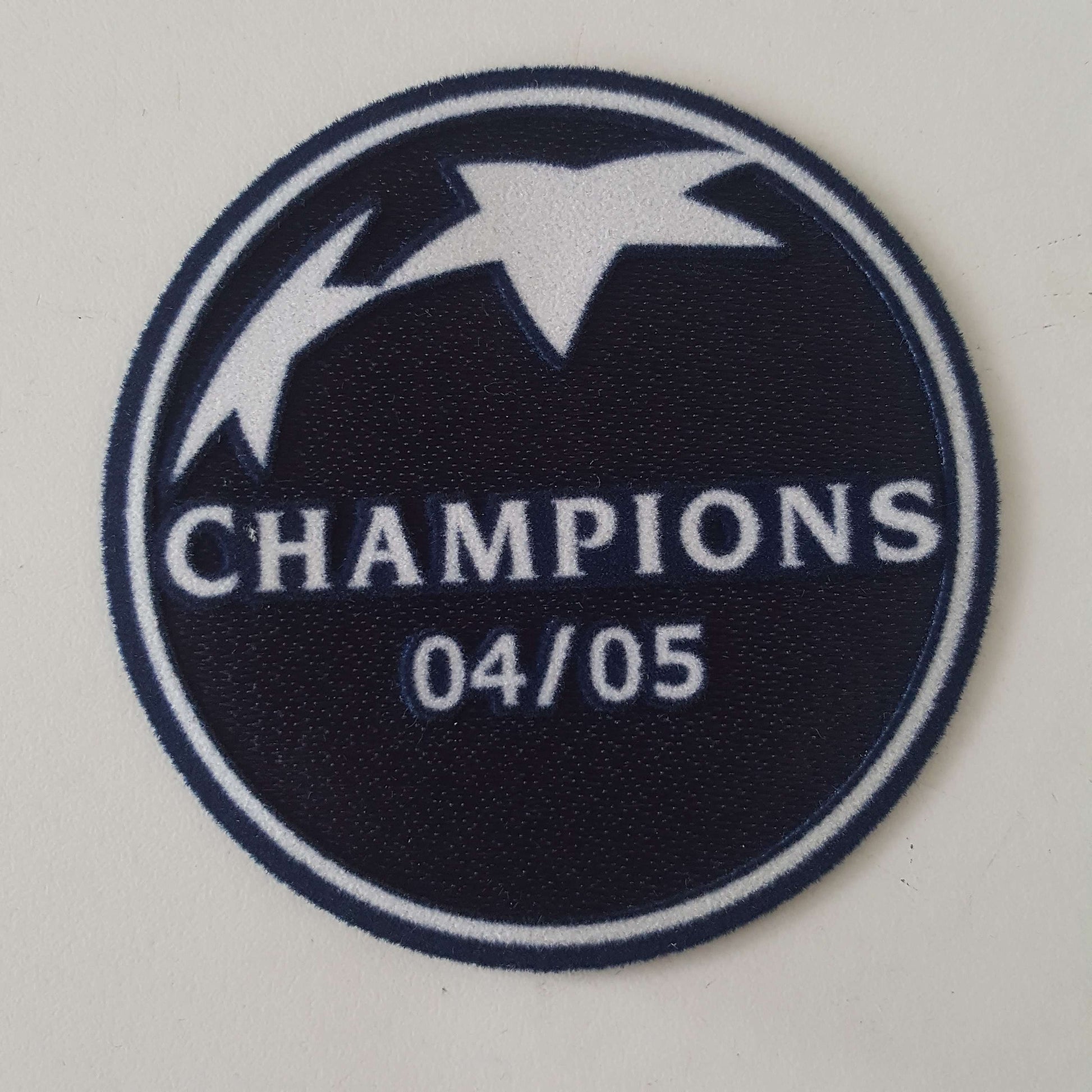 UEFA Badge Of Honour 04/05 Champions League Winner Patch - ClassicFootballJersey
